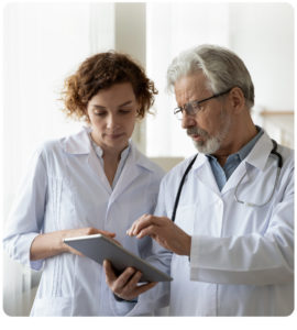 A healthcare representative explaining to another person